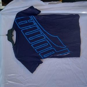 Puma t short. Dark blue with light blue graphics.